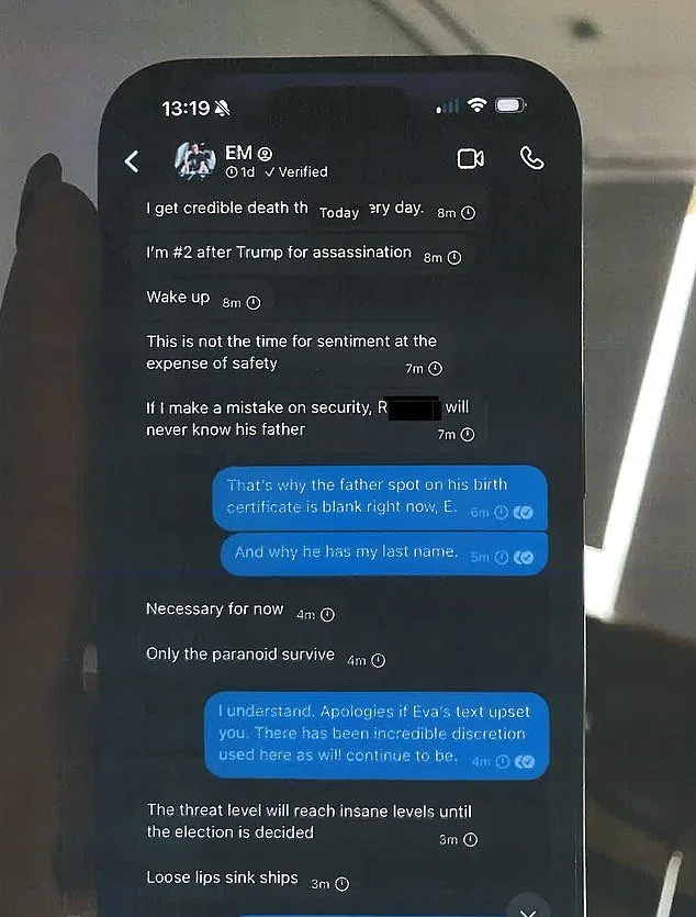 A smartphone screen shows a tense text conversation with a verified contact named 'EM @' discussing credible death threats…