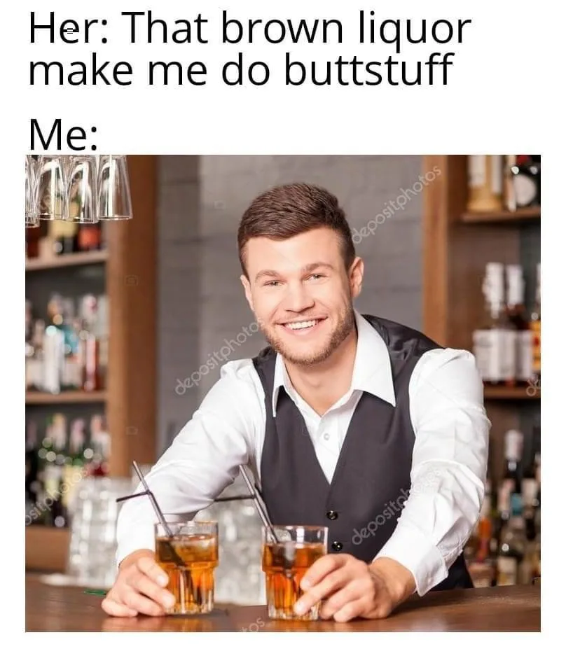 A smiling bartender in a white shirt and black vest holds two glasses of brown liquor with straws at a bar. The text above…