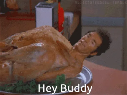 A six-panel image grid shows a man with dark hair lying on his back on a silver platter, dressed in a roasted turkey costume…