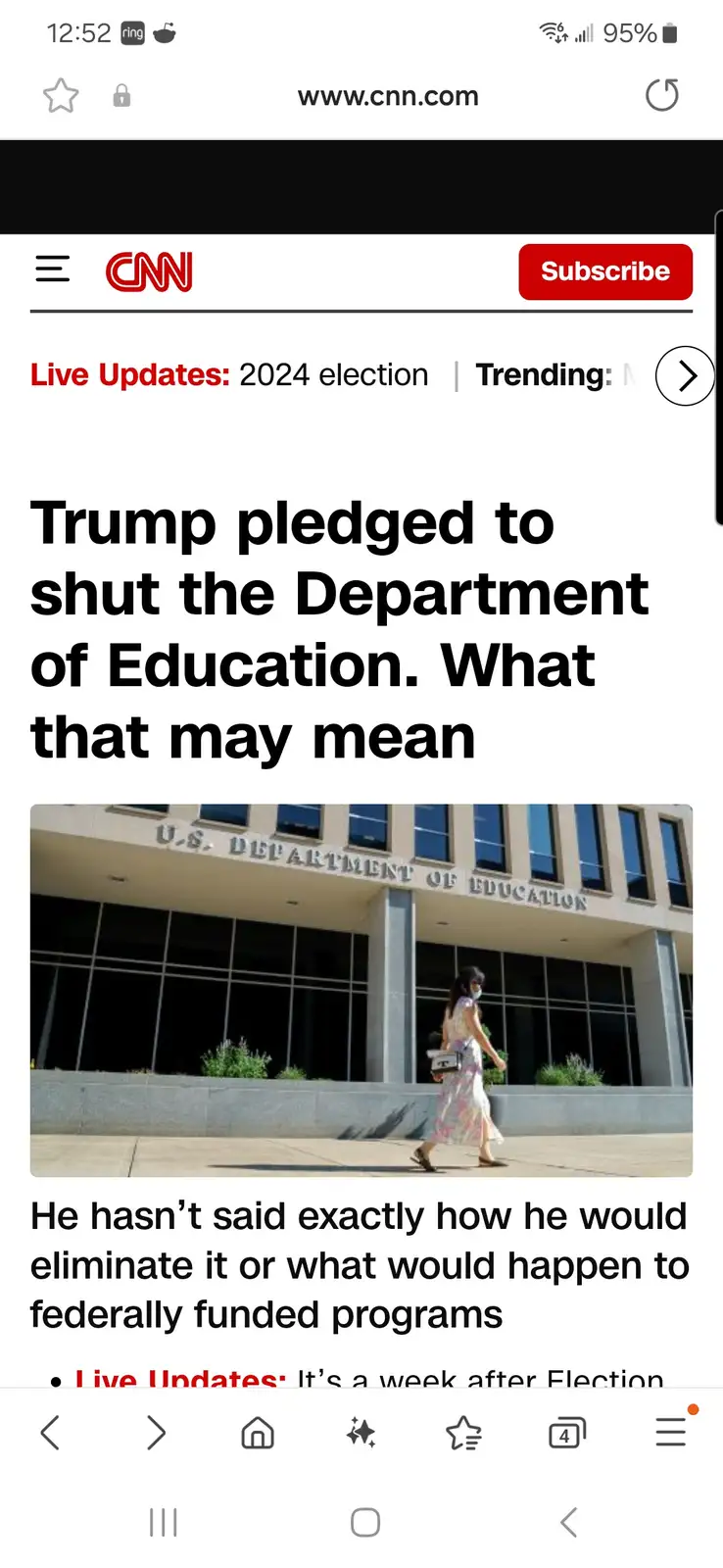 A screenshot of a CNN mobile webpage showing a headline about Trump's pledge to shut down the Department of Education, with…