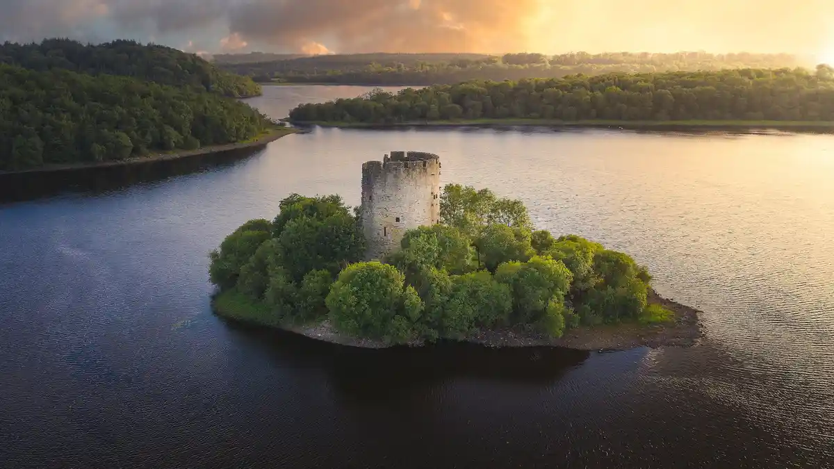 On the River Erne's 80-mile course, Lough Oughter widens into a broad basin, dotted with large and small islands from the…