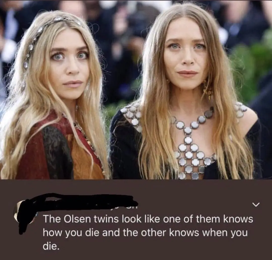 Two women, identified as the Olsen twins, are shown side by side in a public setting, wearing elaborate outfits with…