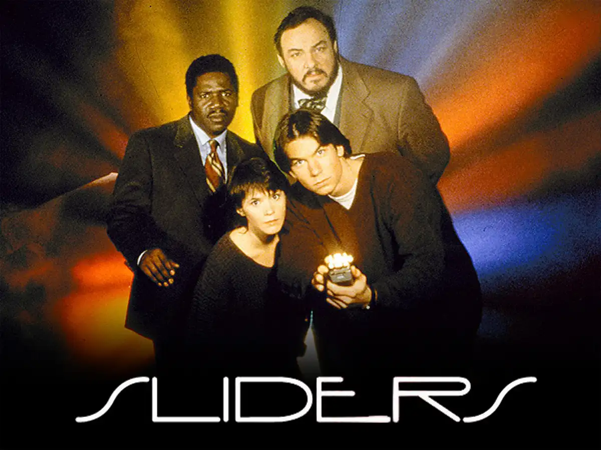 The image is a promotional poster for the TV show 'Sliders,' featuring four main characters posing against a colorful…